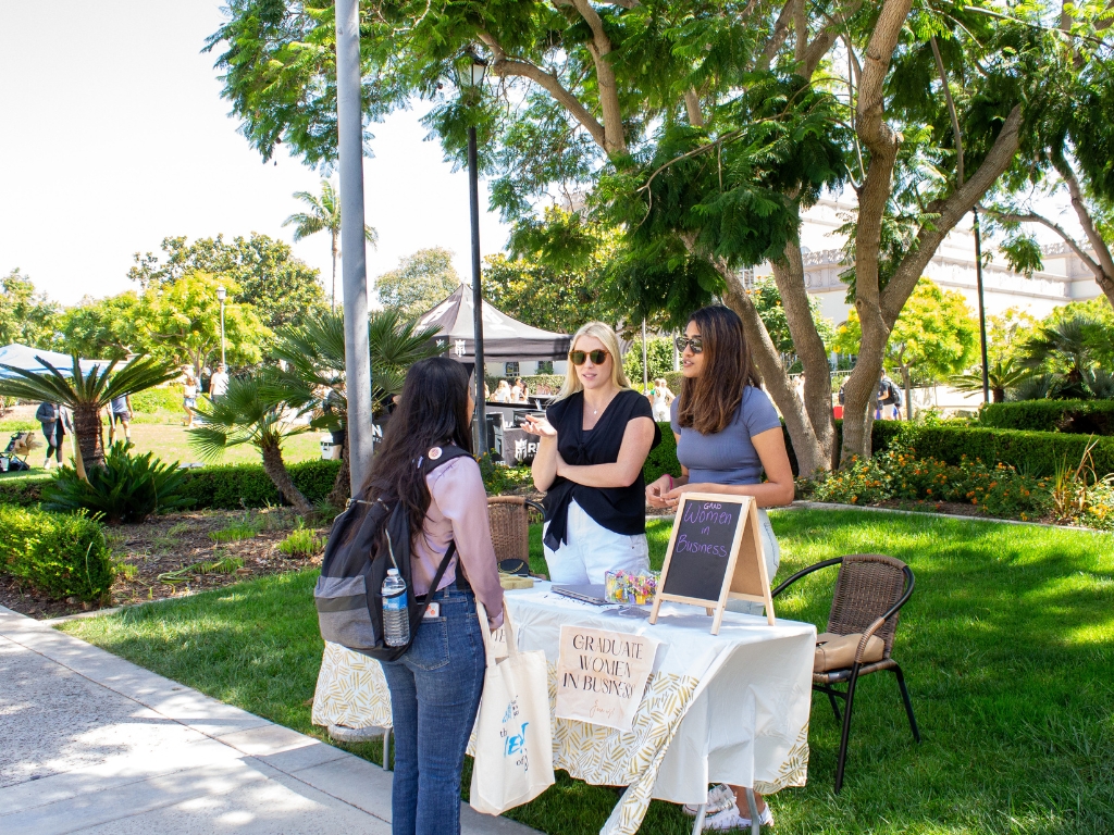 students learn about the graduate women in business club